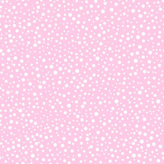 Vector seamless pattern with white polka dots on a pink background