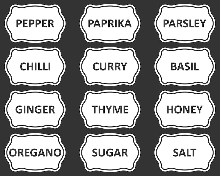 Vector set of stickers or labels for jars of spices .set of 12 vector stickers with names of spices.
